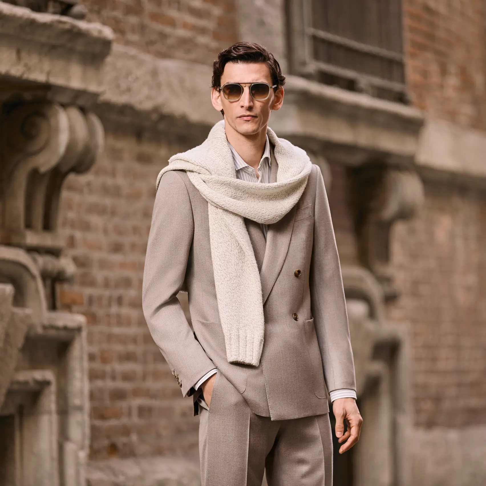 Man in a checked tailored suit, part of the ZEGNA Fall/Winter 2025 collection.